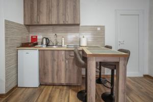 Cucina o angolo cottura di Apartmani ALBION