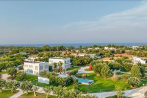 an aerial view of a resort with a pool at Villa VINNER - Monopoli in Monopoli +91 photos