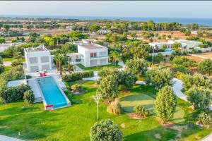 an aerial view of a villa with a swimming pool at Villa VINNER - Monopoli in Monopoli
