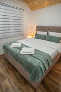 Letto o letti in una camera di Apartmani ALBION