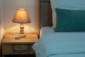 Letto o letti in una camera di Apartmani ALBION