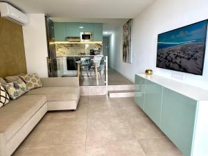Kuchyň nebo kuchyňský kout v ubytování Apartamento Tamarán 105