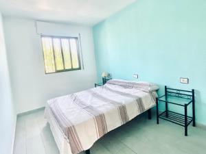 Postel nebo postele na pokoji v ubytování Turyva Tarongers 1 - Modern 1-Bedroom Apartment Near the Beach, Costa del Azahar