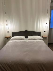 Postel nebo postele na pokoji v ubytování B&B Arco Trinità + 33 fotografií