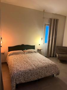 Postel nebo postele na pokoji v ubytování B&B Arco Trinità