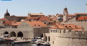 a view of a city with boats in the water at Apartment Dubrovnik in Dubrovnik