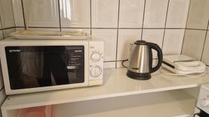Kuchyň nebo kuchyňský kout v ubytování Apartment Nikolina