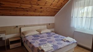 Postel nebo postele na pokoji v ubytování Apartment Nikolina