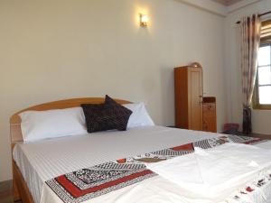 Katil atau katil-katil dalam bilik di Hotel Alas Garden