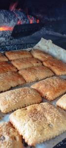 a bunch of food is cooking on a grill at Villa Erry in Trani