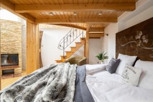 Posteľ alebo postele v izbe v ubytovaní Apartament Grand Krupówki 47