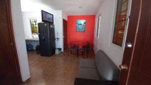 TV a/nebo společenská místnost v ubytování Casa 3 flamencos - estudio y apartamento