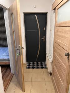 Postel nebo postele na pokoji v ubytování Pokoje w Nowosolnej