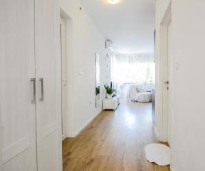 Łóżko lub łóżka w pokoju w obiekcie Deluxe Apartments Goya