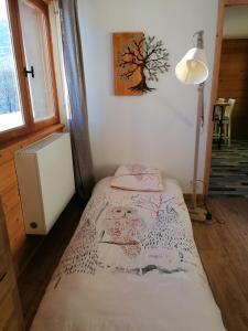 Postel nebo postele na pokoji v ubytování Les Marm'hôtes