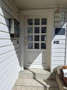 a front door of a house with a window at FeBo am Wolfsgarten in Bad Harzburg