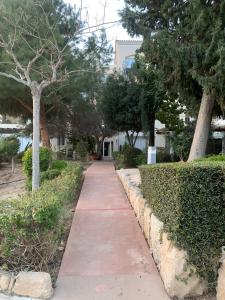 Zahrada ubytování Cozy 2BR APT - Swimming pool - Hesperides