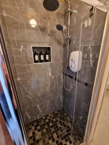 Koupelna v ubytování Vimy House + 3 fotografie