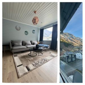 ein Wohnzimmer mit Sofa und Tisch in der Unterkunft StarApartment Trolltunga 2 BR in Odda