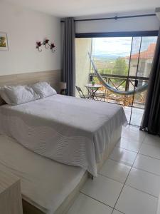 Postel nebo postele na pokoji v ubytování Flat no Condomínio Monte Castelo, Gravatá-PE