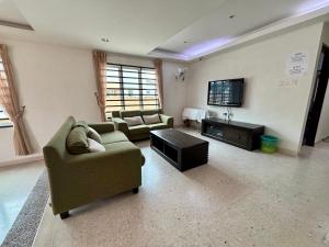 Μια τηλεόραση ή/και κέντρο ψυχαγωγίας στο Meng Meng GuestHouse