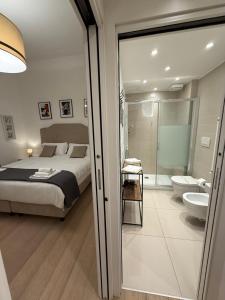 A bed or beds in a room at Luxury apt in the heart of city out of ZTL