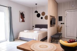 A bed or beds in a room at Nektaria Studio