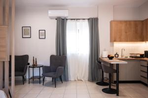 A kitchen or kitchenette at Nektaria Studio