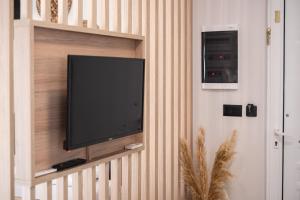 A television and/or entertainment centre at Nektaria Studio