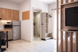 A kitchen or kitchenette at Nektaria Studio