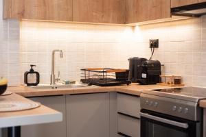 A kitchen or kitchenette at Nektaria Studio