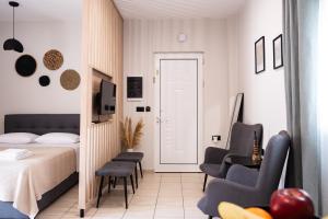A bed or beds in a room at Nektaria Studio