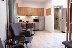 A kitchen or kitchenette at Nektaria Studio