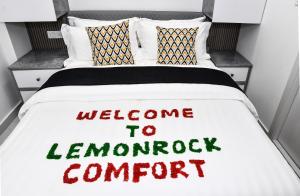 Postel nebo postele na pokoji v ubytování LemonRock Comfort