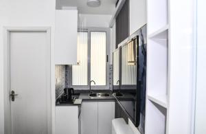 Kuchyň nebo kuchyňský kout v ubytování LemonRock Comfort