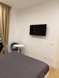 TV a/nebo společenská místnost v ubytování Acqua di Mare