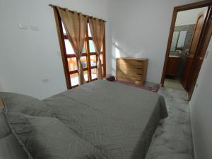 Voodi või voodid majutusasutuse Refugio Chamahua toas