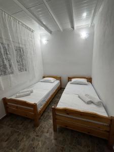 Ένα ή περισσότερα κρεβάτια σε δωμάτιο στο House With View of OLYMPUS