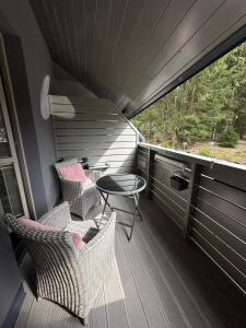 Balkón alebo terasa v ubytovaní Harrachov Resident Apartments "Terrace & Chill" - high speed WiFi, možnost snídaně, Smart TV, Netflix, Disney plus