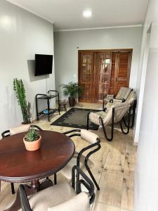 Телевизор и/или развлекательный центр в Apartamento no Centro de Santana do Livramento