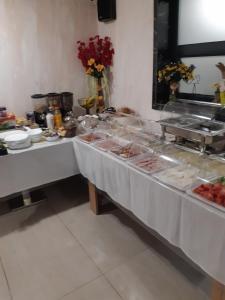 a buffet line with meat and other food items at Hotel Boutique 5 - Free parking - Free breakfast - Free internet - EVSE in Sofia