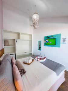 Postel nebo postele na pokoji v ubytování Pousada Meraki Beach