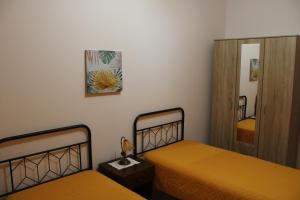 Postel nebo postele na pokoji v ubytování casa blu