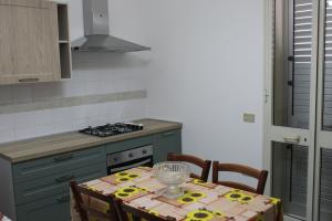 Kuchyň nebo kuchyňský kout v ubytování casa blu