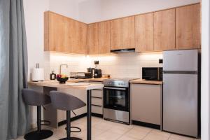 A kitchen or kitchenette at Nektaria Studio