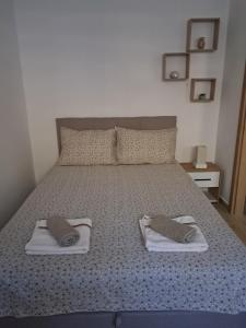 Voodi või voodid majutusasutuse Apartman Zvezdica toas