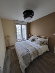 LE TOURISTIC Appartements客房内的一张或多张床位