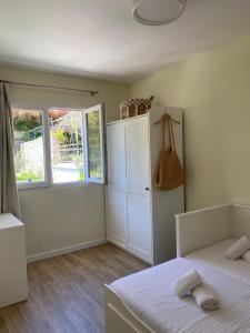 Voodi või voodid majutusasutuse 2BR apartment with sea view! toas
