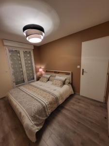LE TOURISTIC Appartements客房内的一张或多张床位