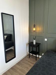 En eller flere senge i et værelse på Les Oliviers - Centre ville de Saumur